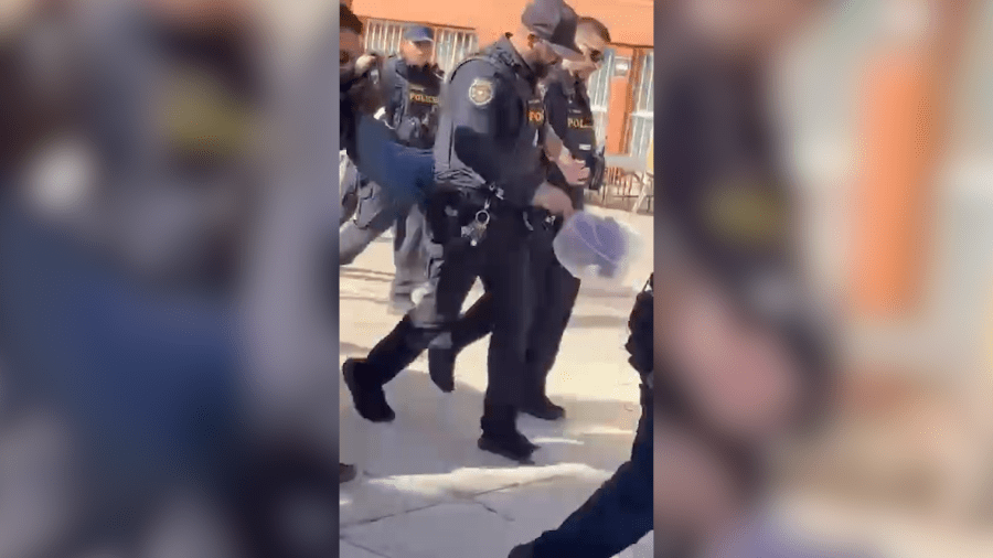 Videos show officers restrain Las Vegas student with ‘spit mask’