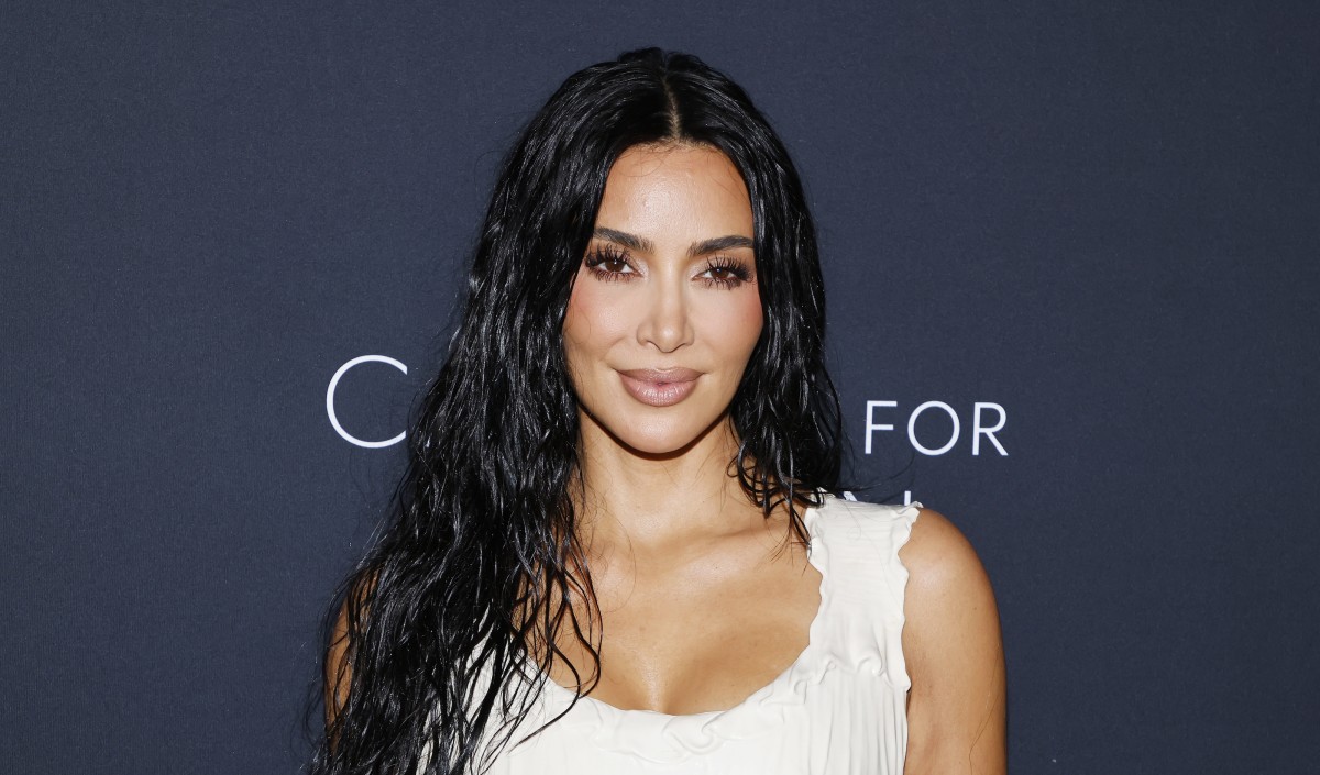 Kim Kardashian Stuns in Skintight Dress With Plunging Neckline