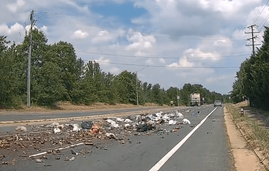Garbage truck leaves trail of trash on Fairfax County road