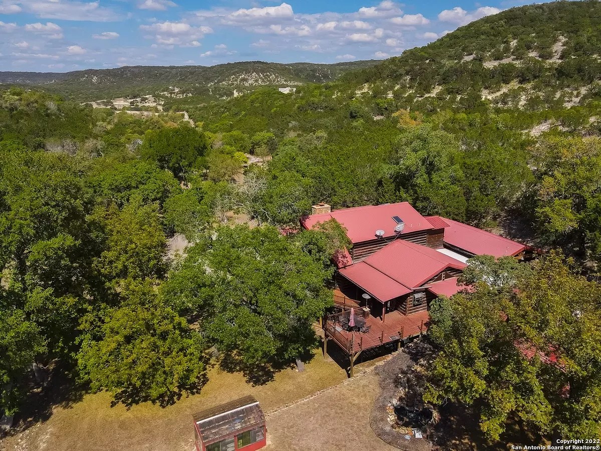 This San Antonioarea log cabin comes with its own onsite hobbit house