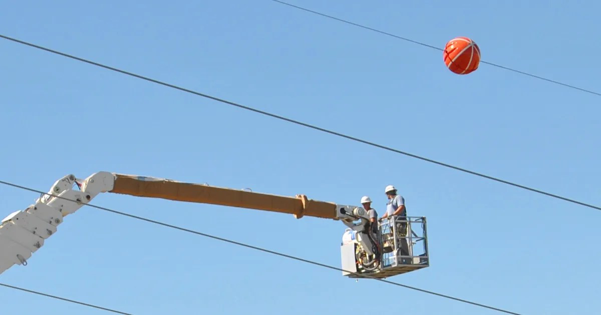 Red Balls on Power Lines: Why Are They Up There? | Snopes.com