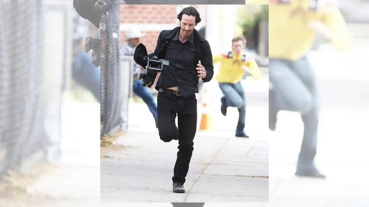 Authentic Photograph of Keanu Reeves Stealing Paparazzi Camera