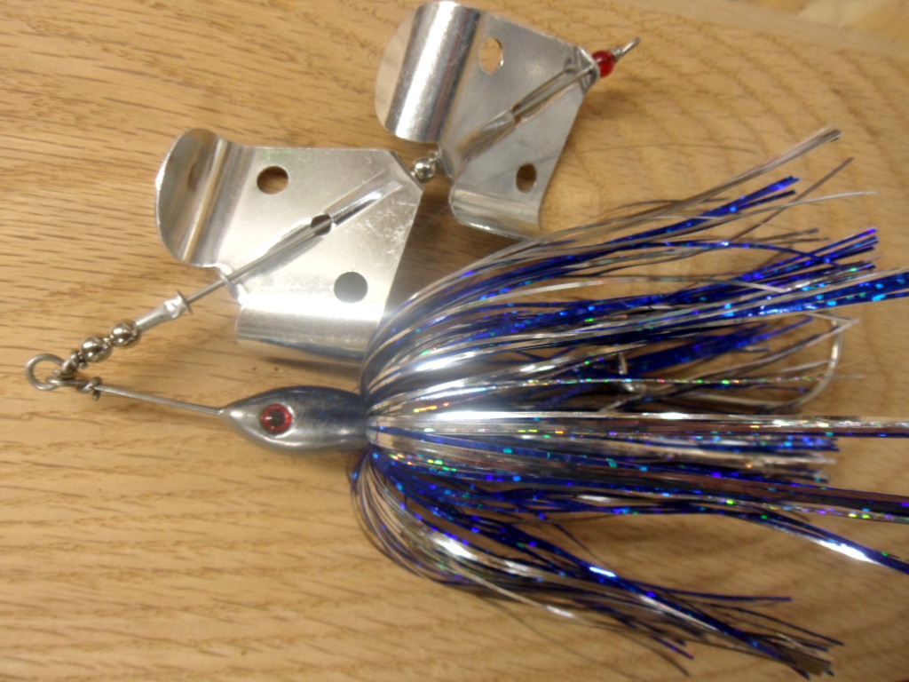 The 3/4 ounce Musky Buzz, in Chrome Blue Shad Megachomp Lure Company