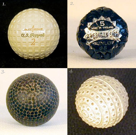 Four OldTimey Golf Balls