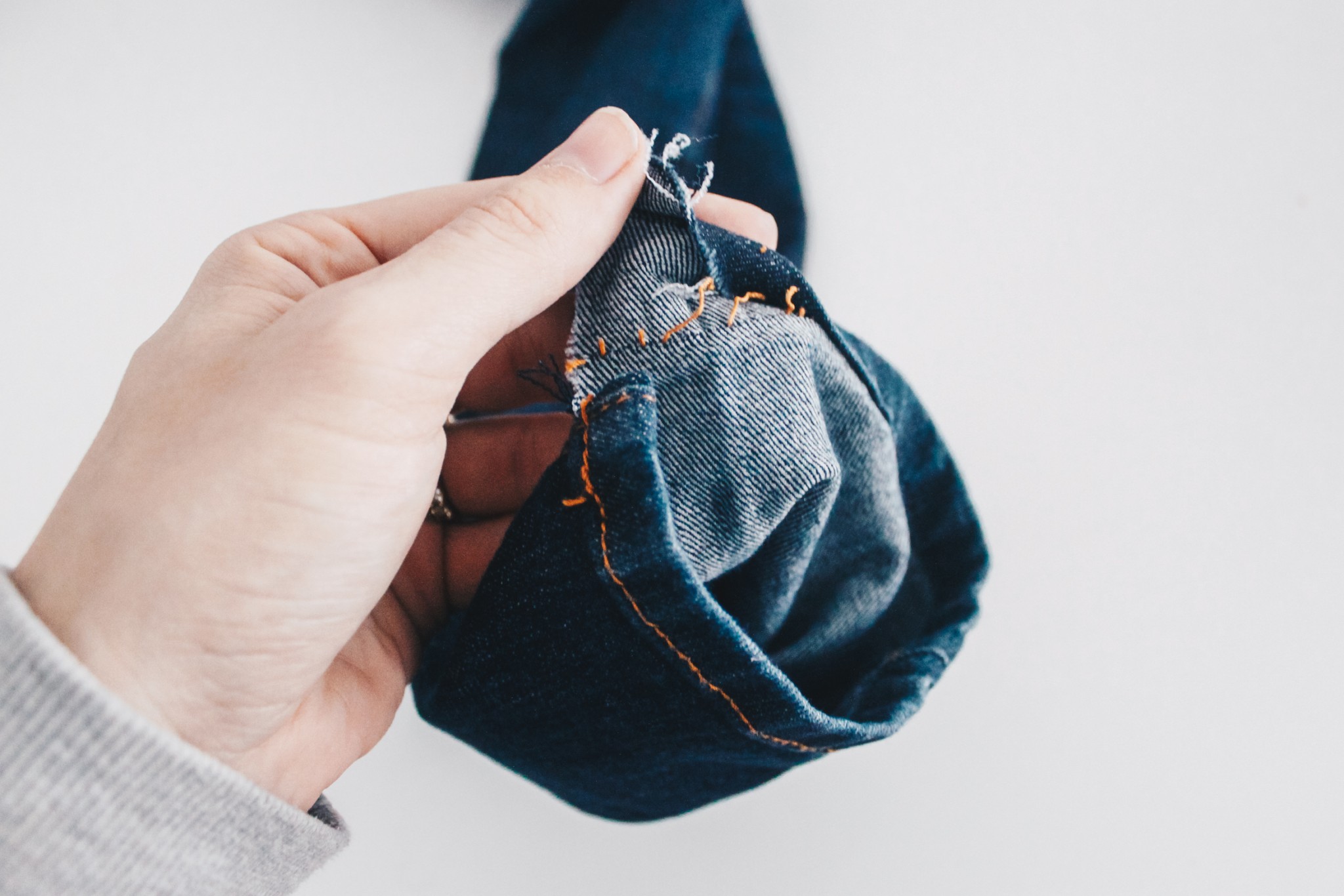 how to distress the hem on your jeans Meg McMillin