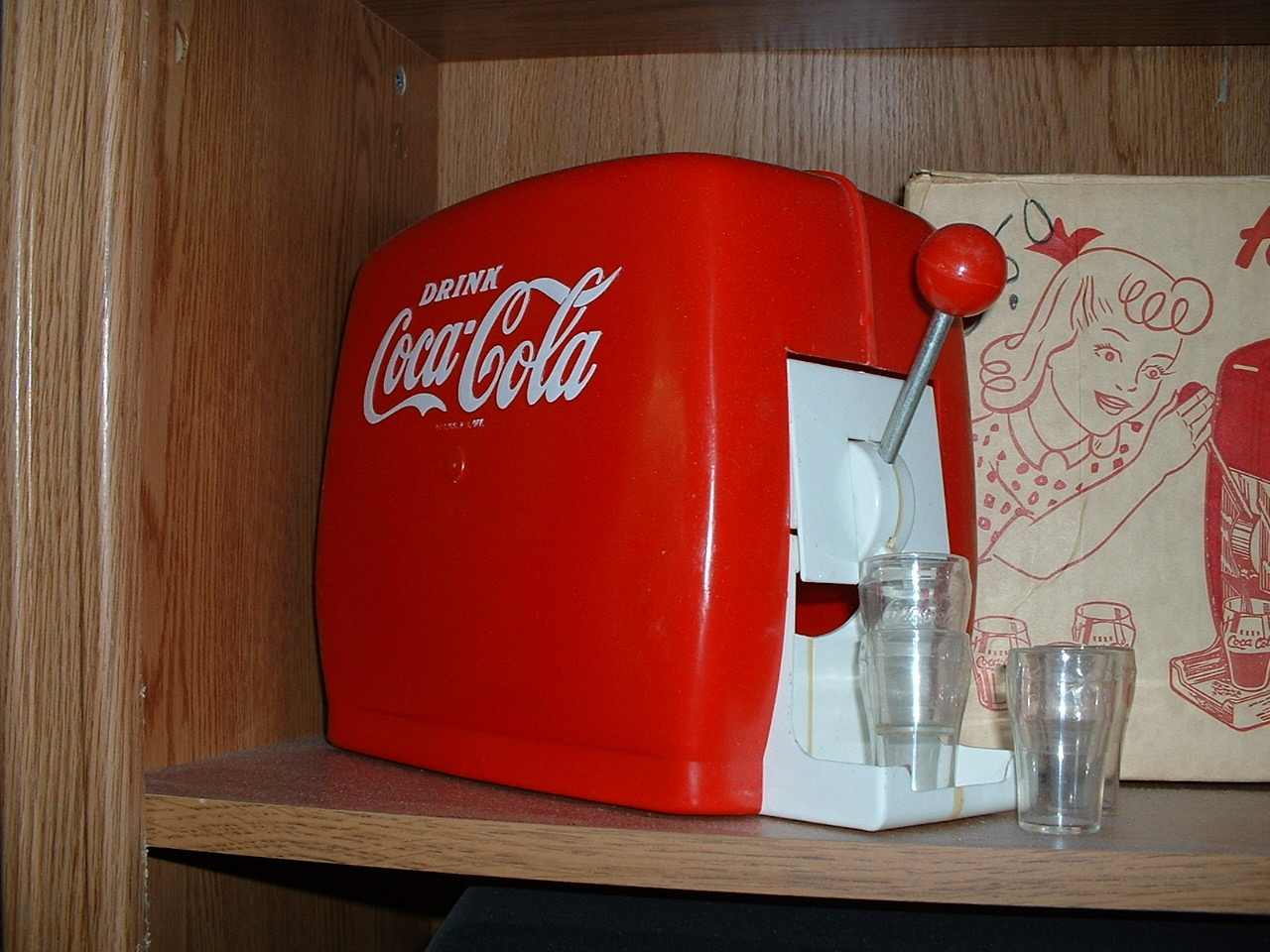 Toy soda pop dispensers