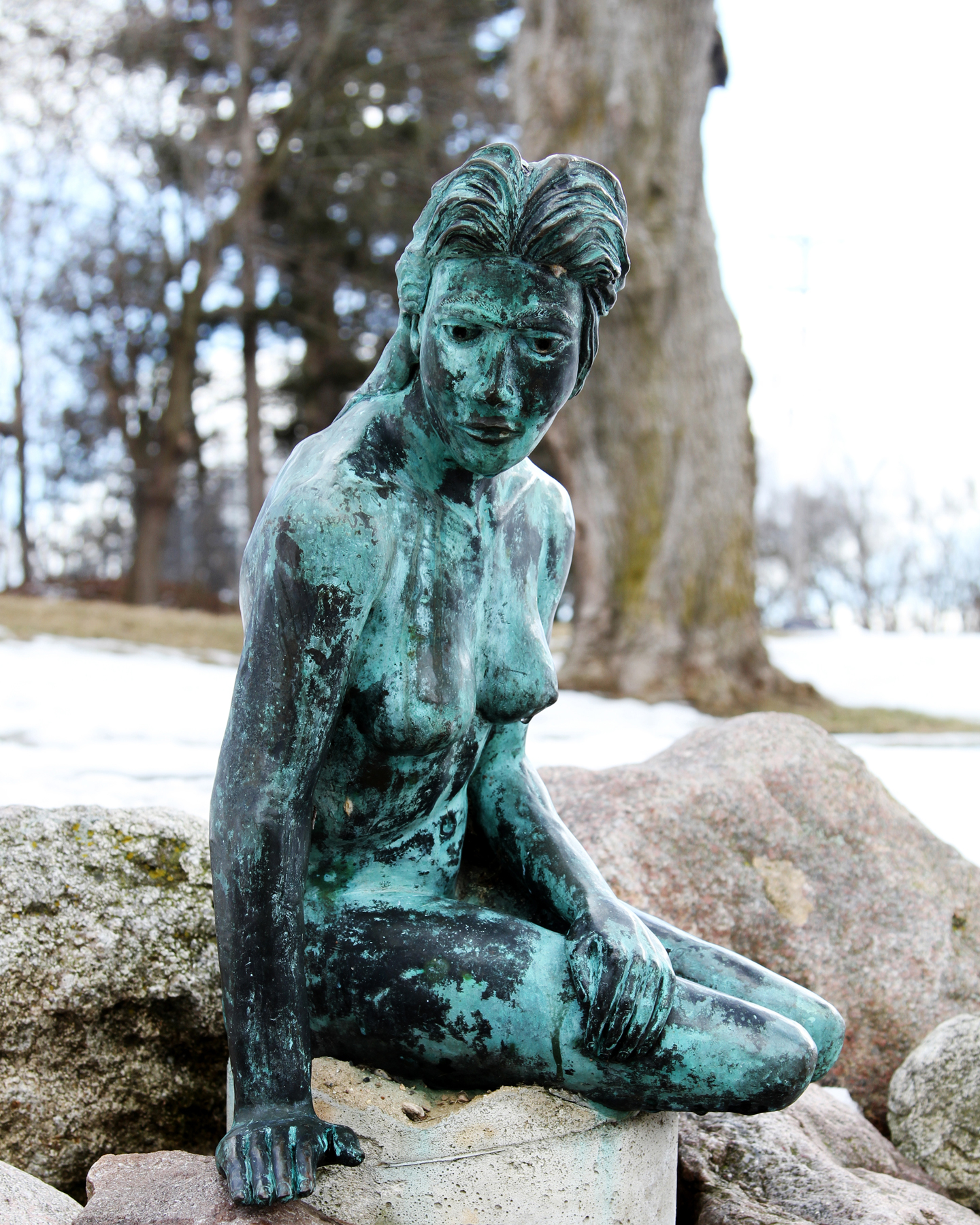 The Little Mermaid statue on Flat River, Greenville Michigan