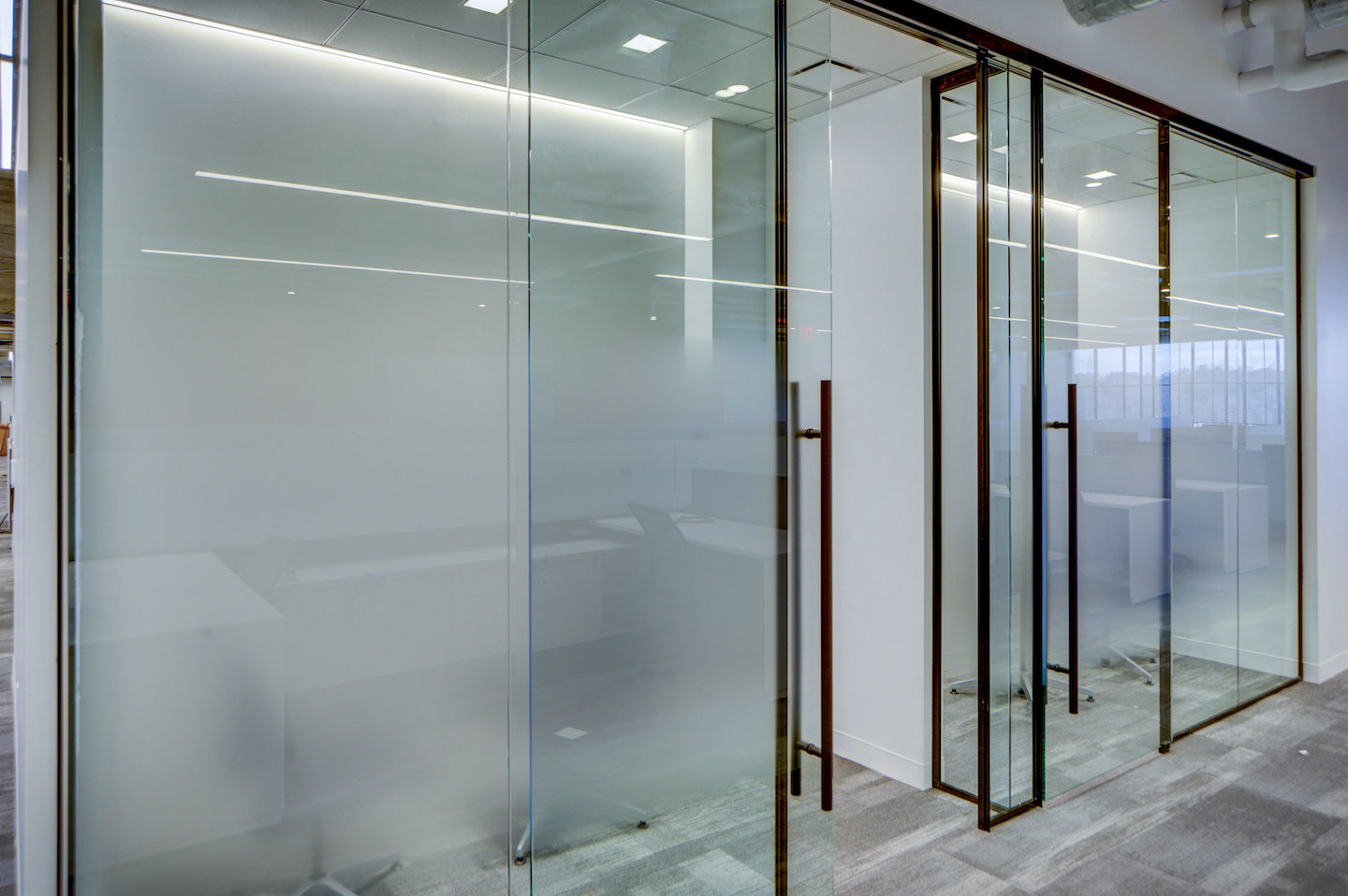 Sliding Doors vs. Hinged Doors in the Office MetroWall