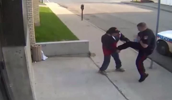 Homeless man smashes head after being kicked to ground by police