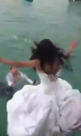 Bride nearly drowns after jumping into the sea in wedding 'trash the dress' stunt Metro News
