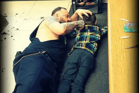 Barber Lies On Floor To Cut Autistic Boy S Hair To Make Him Feel
