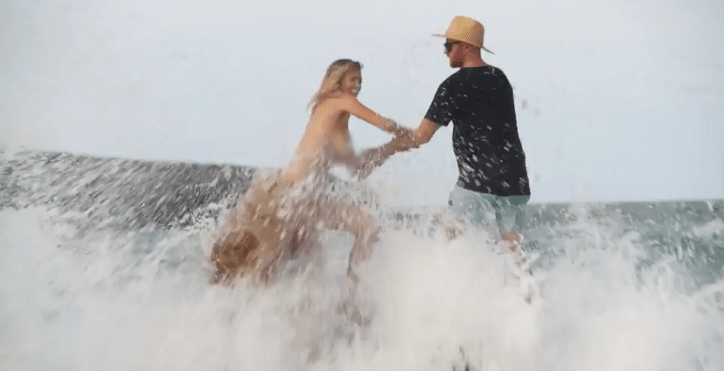 Topless Kate Upton falls off rock as waves sabotage Sports Illustrated