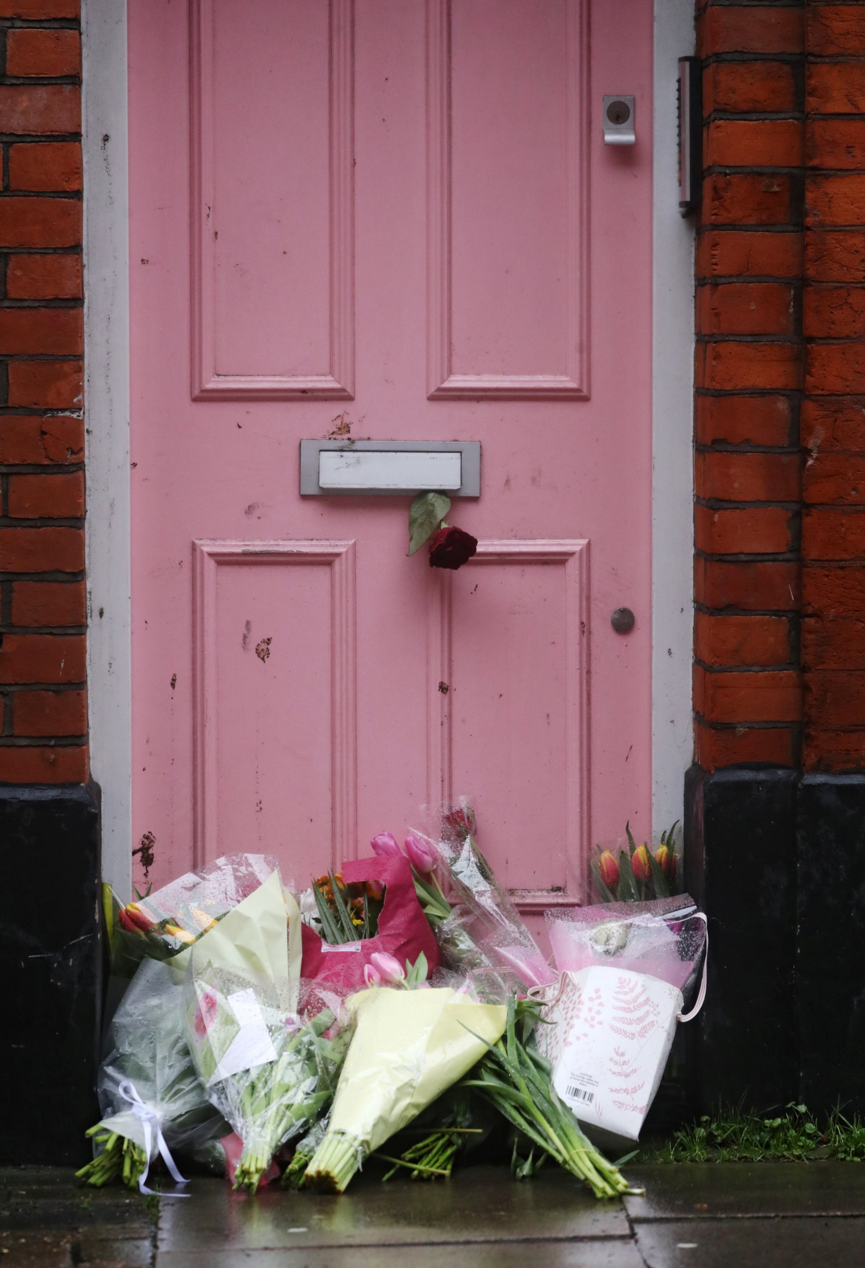 Flowers lie outside British television presenter Caroline Flack's old house in Islington, London, Britain February 16, 2020. REUTERS/Simon Dawson