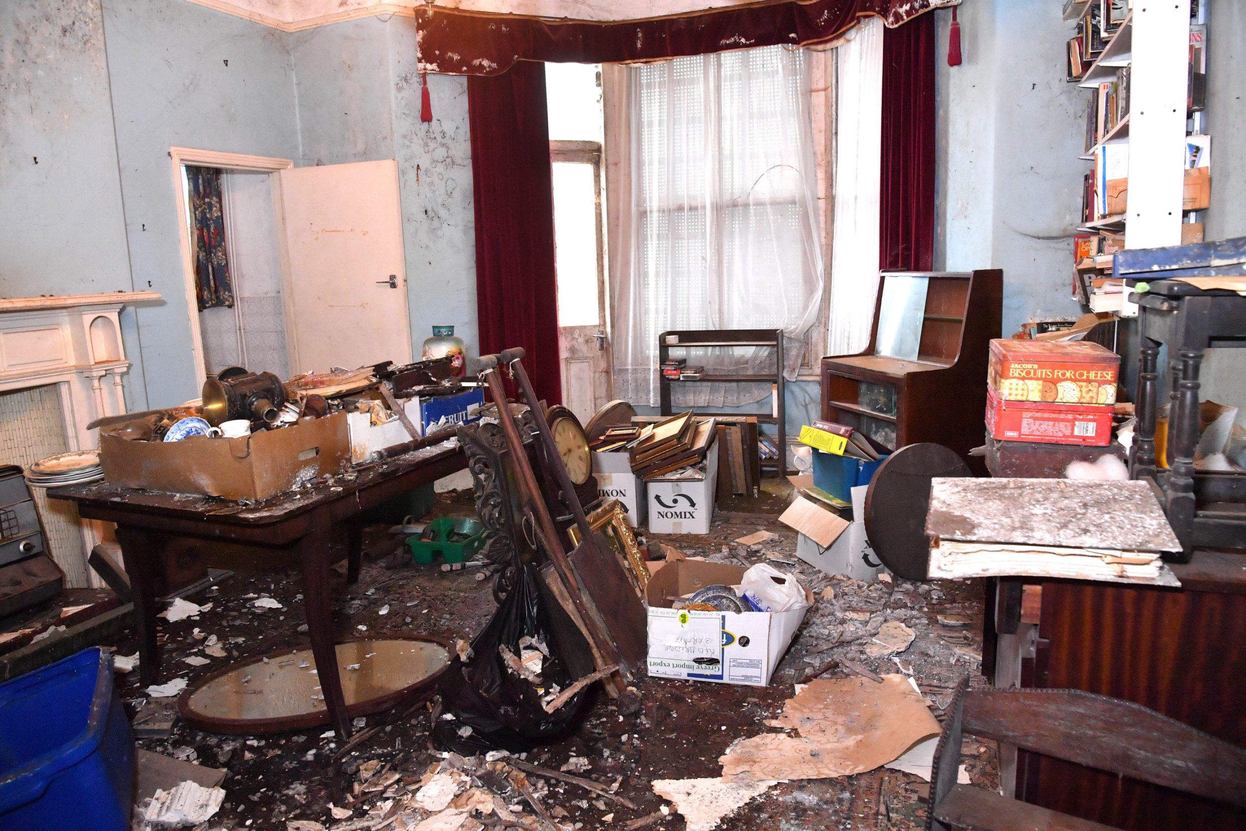 Abandoned derelict building on posh Wales street on sale for £325,000