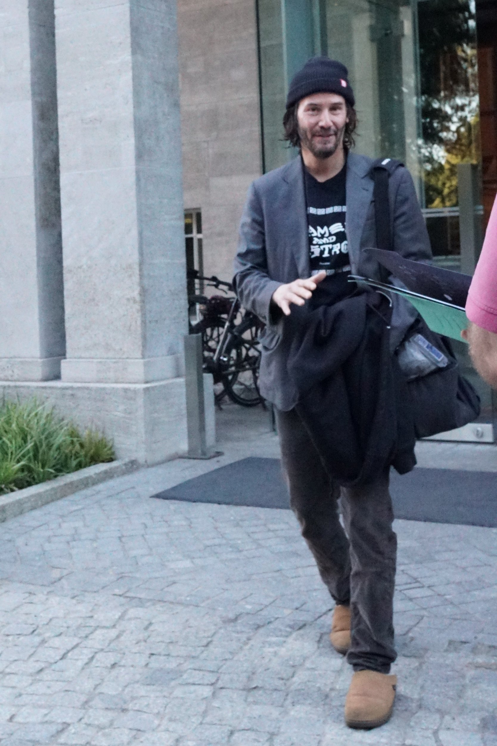 Keanu Reeves rocks slippers to John Wick 4 set because