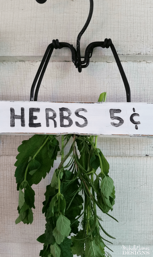 Use chalk paint to create painted wooden hangers