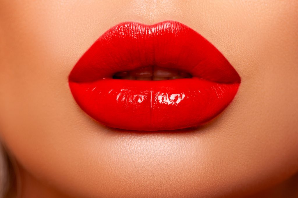 Red Lip gloss. Beautiful natural lips Red color. Sexy Lips. Beautiful
