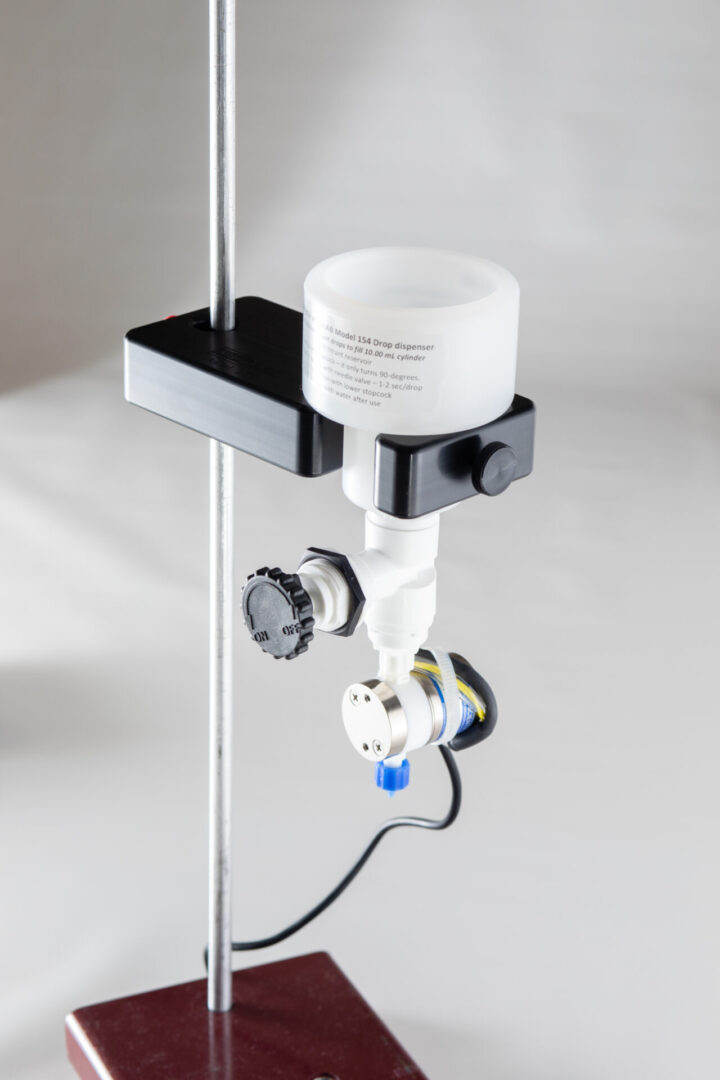 Model 254Automated Constant Volume Drop Dispenser & Clamp MicroLAB Inc