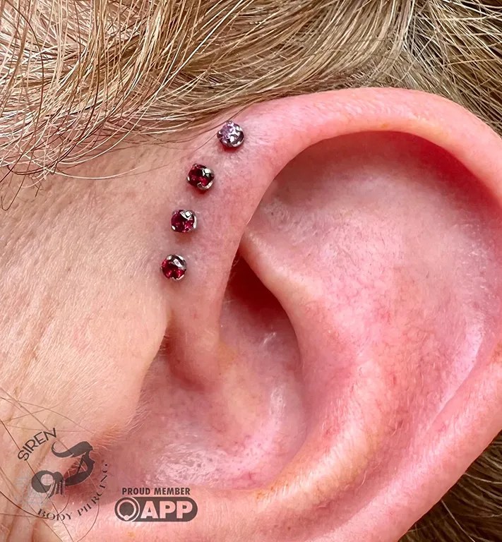 Body Piercing Portfolio gold piercing jewelry Siren Body Piercing