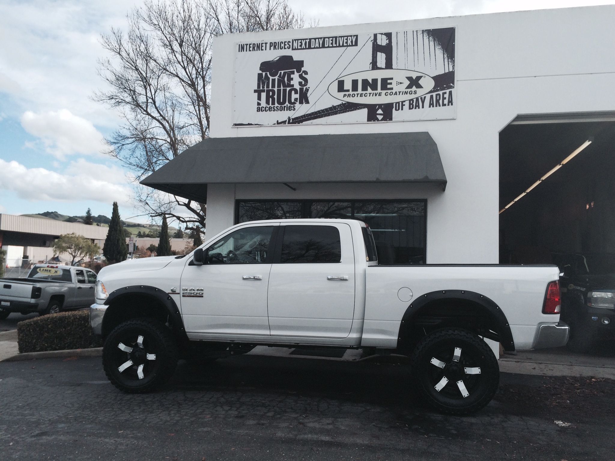 New Truck gets LineX bed and AWESOME custom lift install Mike's