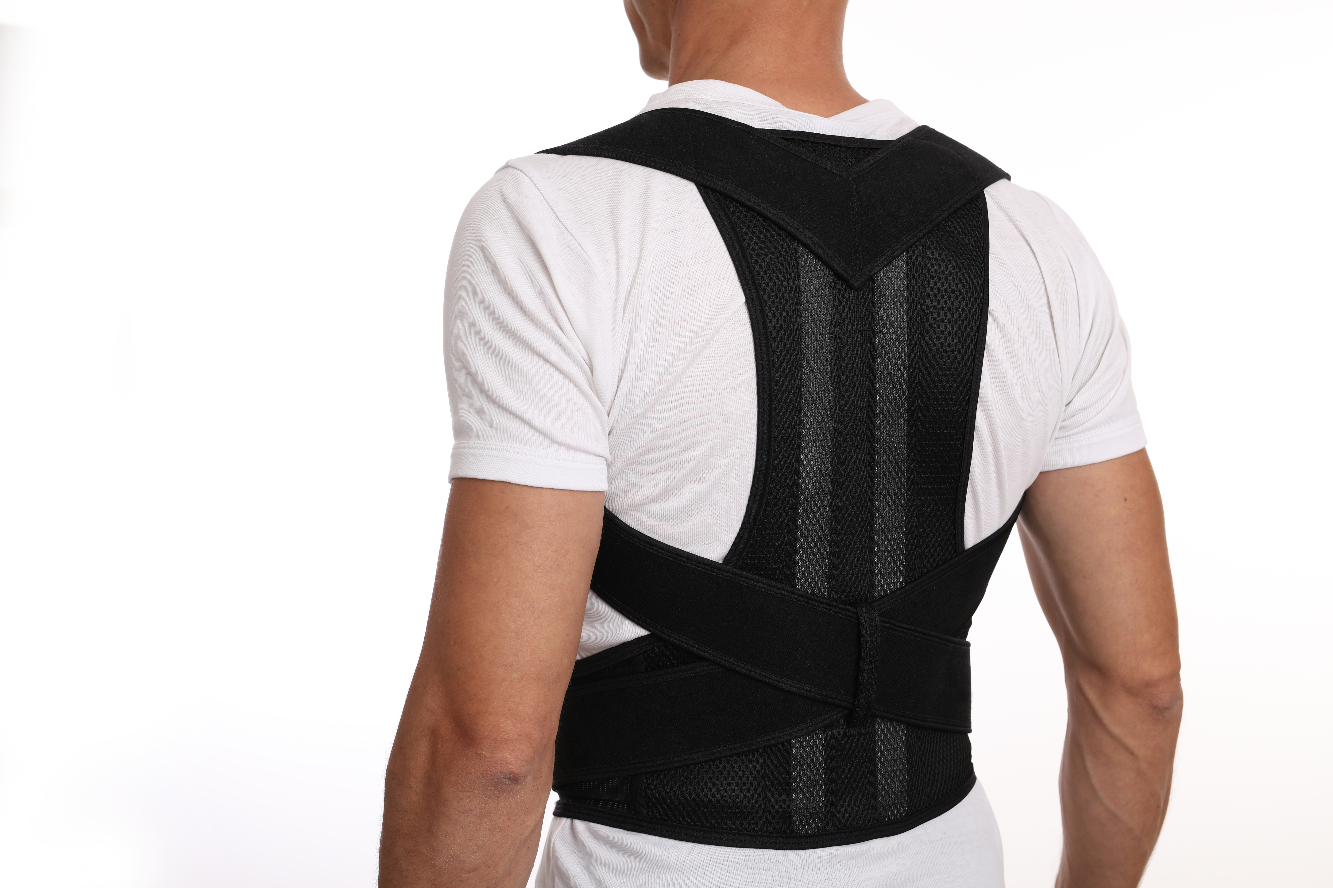 Man with posture corrector. Scoliosis, Kyphosis treatment Mile High