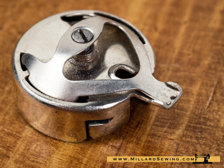 Bobbin Case (Original) for Rotary Hook Sewing Machine (New Home/Free