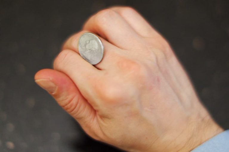 How To Roll A Coin Across Your Knuckles Then Vanish
