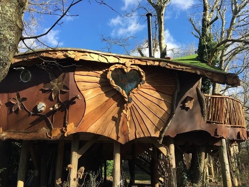 Stay in a treehouse at Blackberry Wood campsite in Sussex