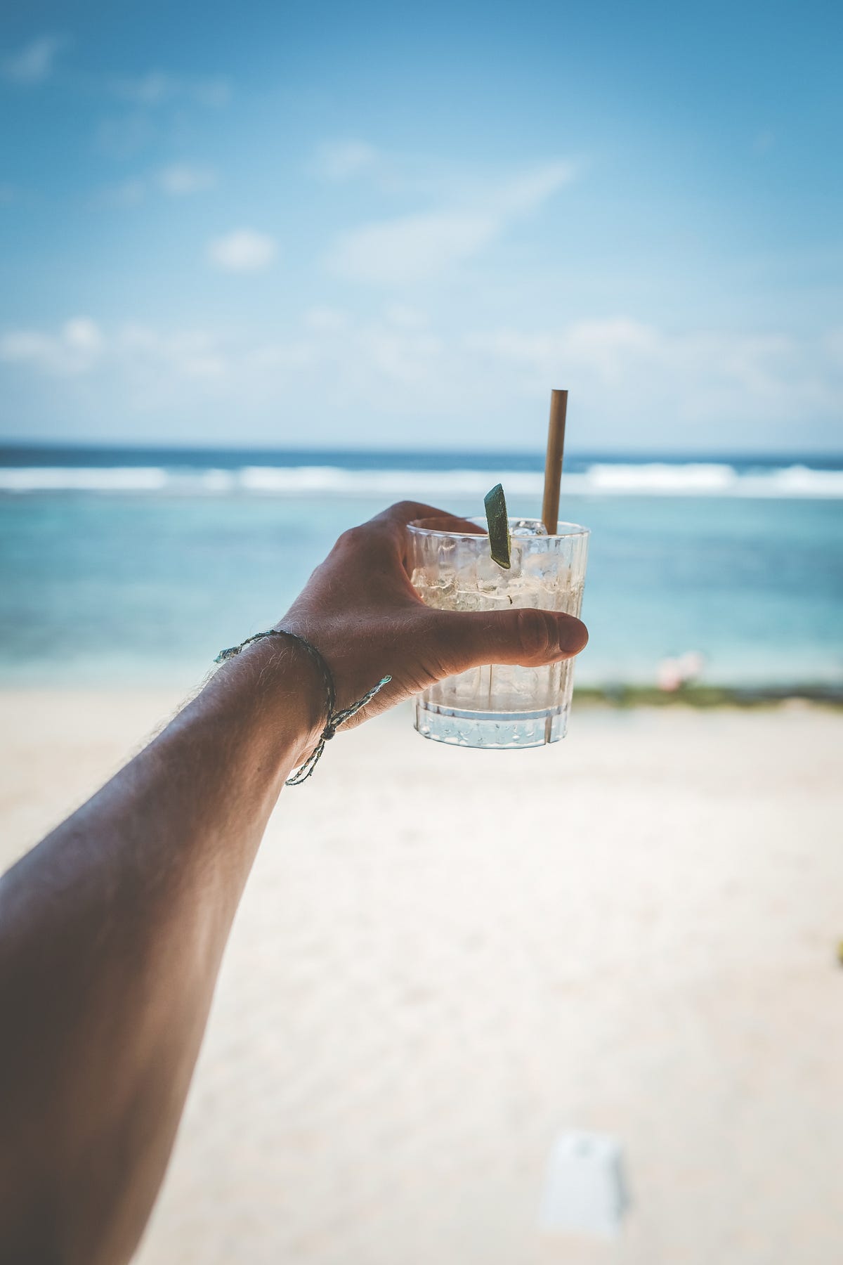 Why Working and Sipping Cocktails on the Beach, Will Not Make You Happy