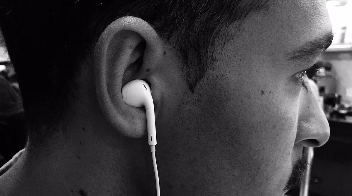 Wearing Apple earphones sideways will change your life by dayenjoyer