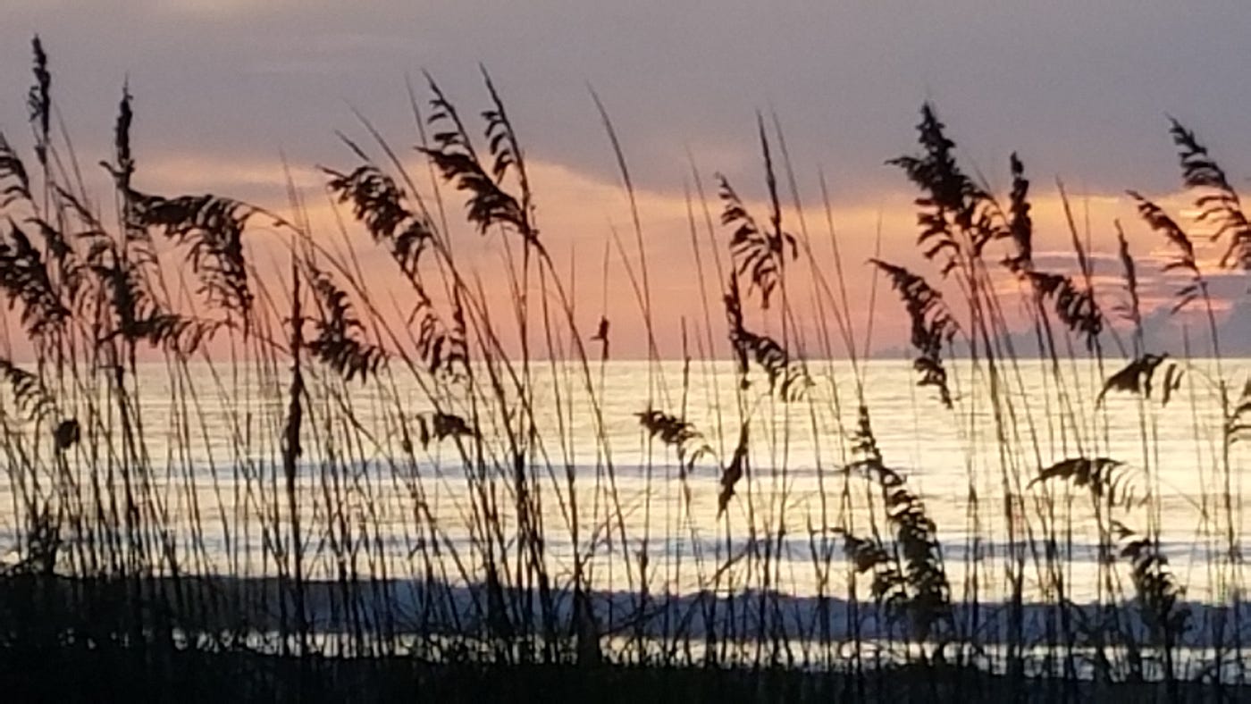 Cocoa Beach at Sunrise. This could be a typical morning if you… by Eric Larkin Medium