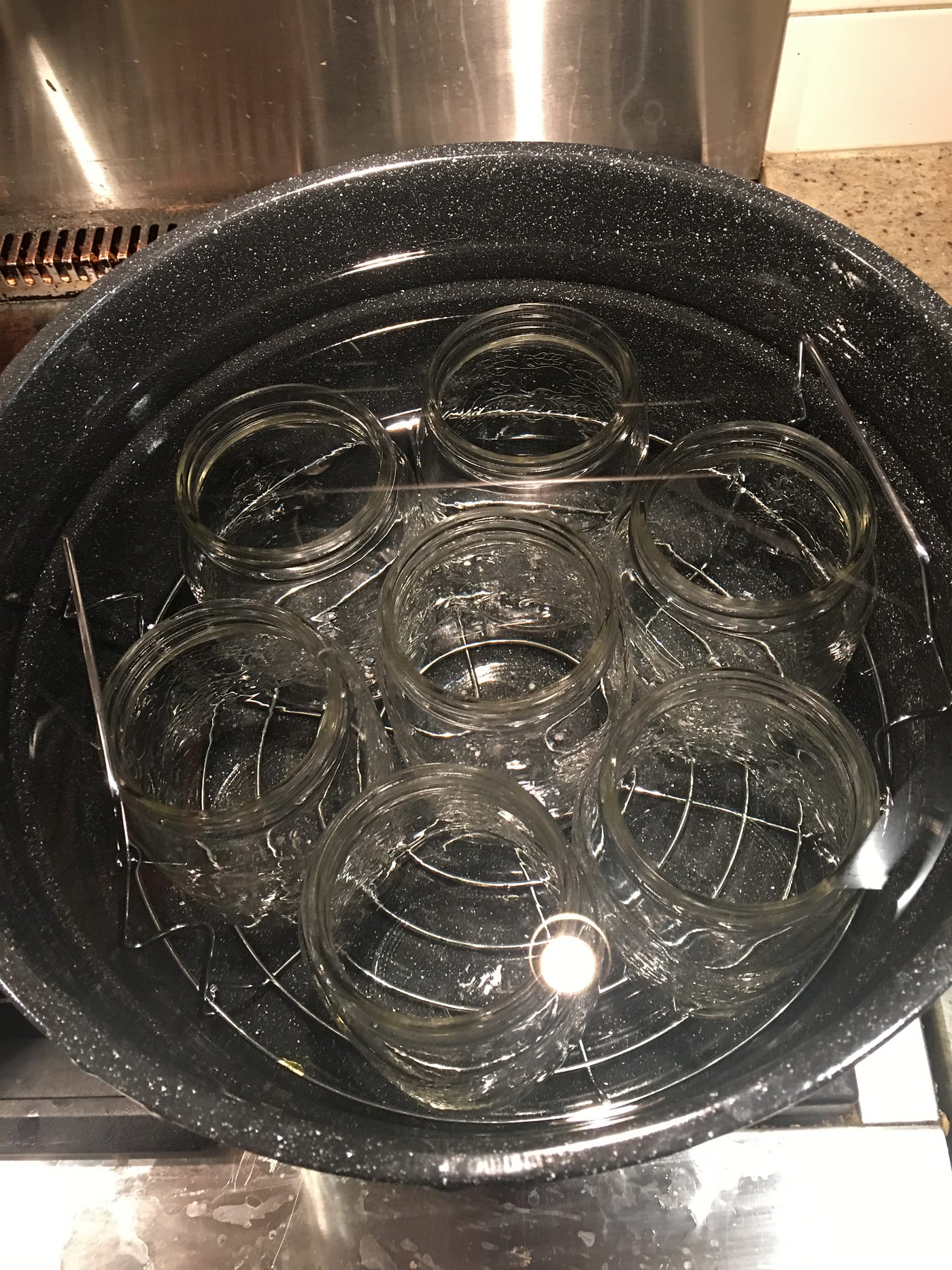 Turning a bushel of tomatoes into beautiful sauce! by Mark