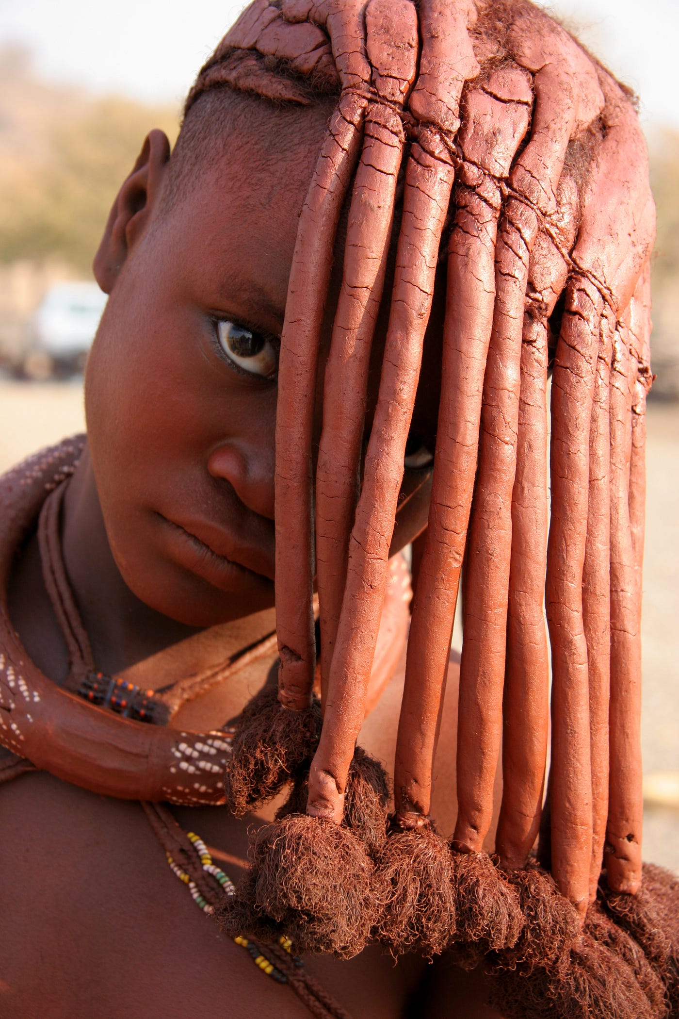 The Unique Hairdo Of Himba Women. Red Ochre — The Color of Earth and