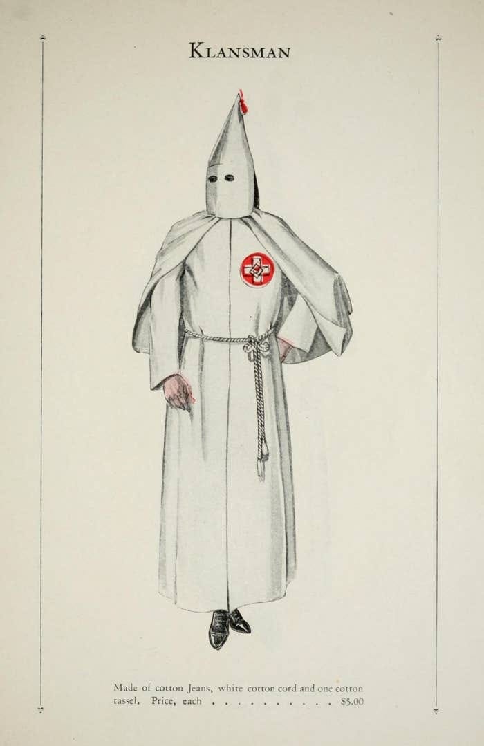 The important element is that the robe is white, the color of purity and righteousness, as well as joy, victory, and perfection. It appears as a square white cross in black outline against a circular red background. The Origin Of The Klan Robe And The Meaning Of The Colors by William