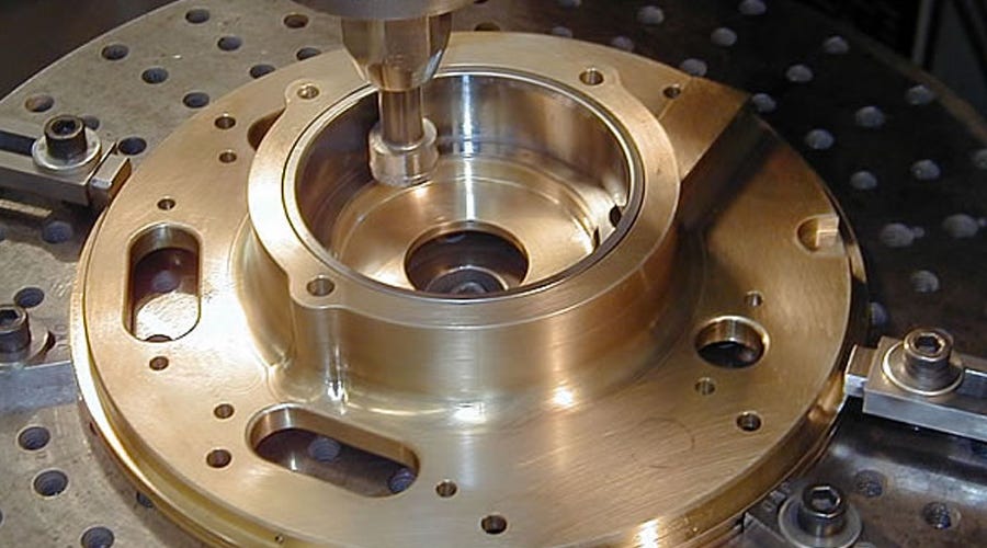 What are the differences between CNC lathes and CNC milling machines