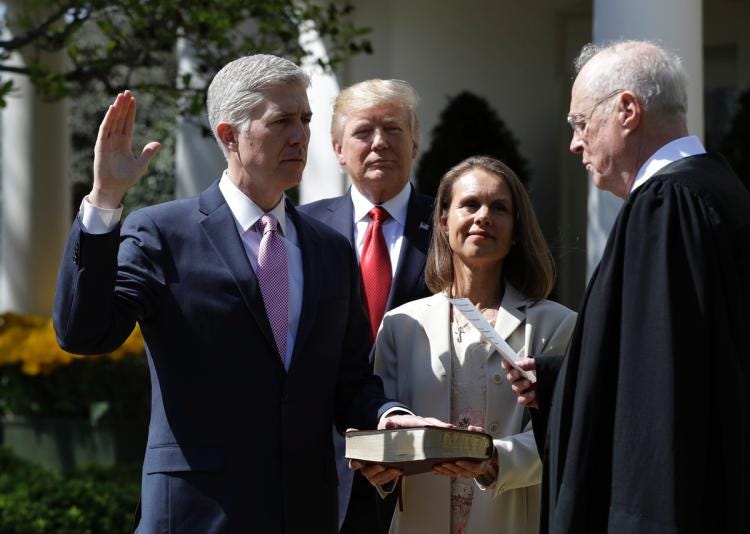 Trump Instructs Family To Lie Under Oath By Holding Hand An Inch Over