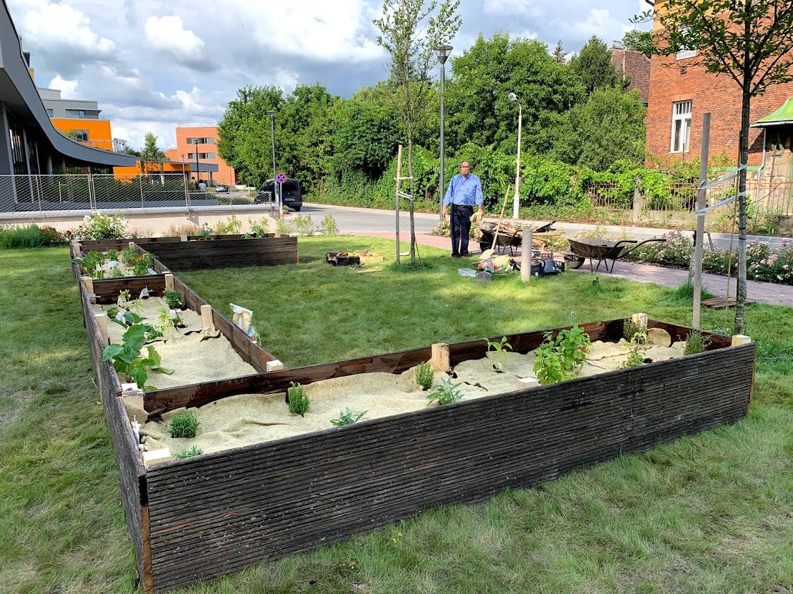 Building Upcycled Raised Garden Beds Captures the Real School Spirit