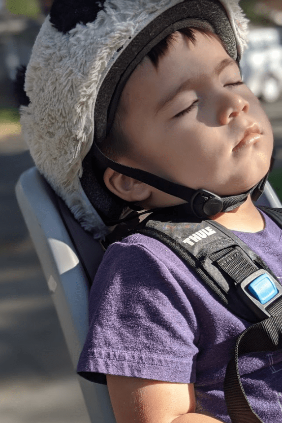 When is it okay for a toddler to sleep on the back of a bike? by Dad
