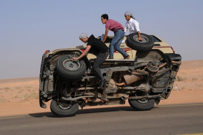Changing The Tires On A Moving Car by Corsair's Publishing Corsair