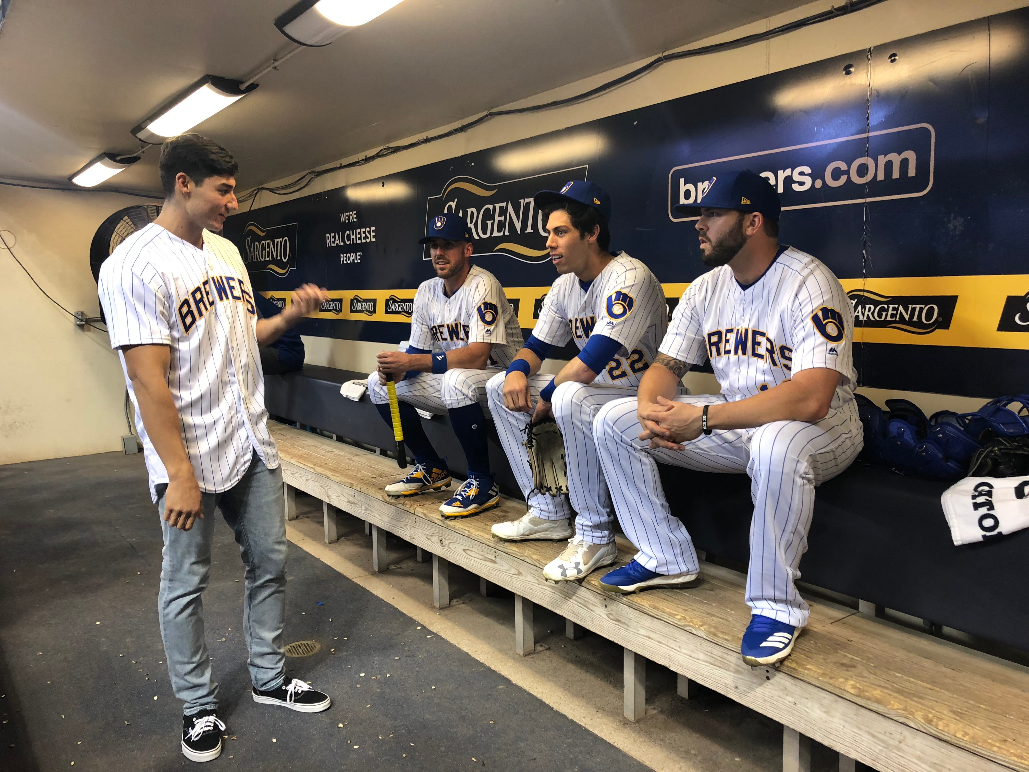 Cameron Yelich Throws Ceremonial First Pitch by Caitlin Moyer Medium