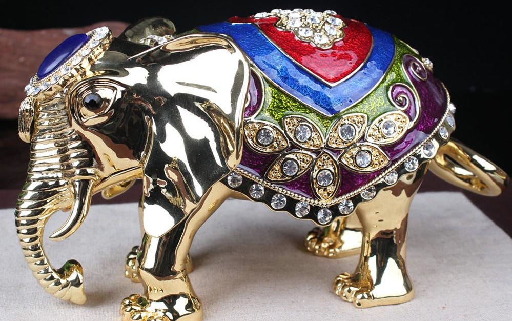What do Elephants stand for in African and Asian Cultures ? by Collectable Medium