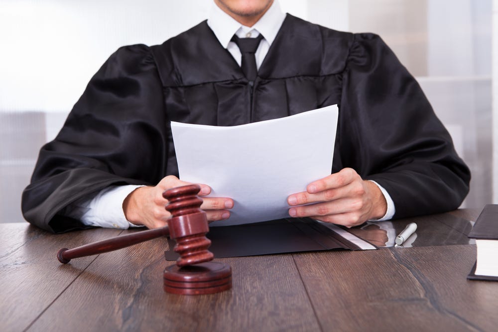 Why Do Judges Wear Black Robes?. A black robe is often associated with