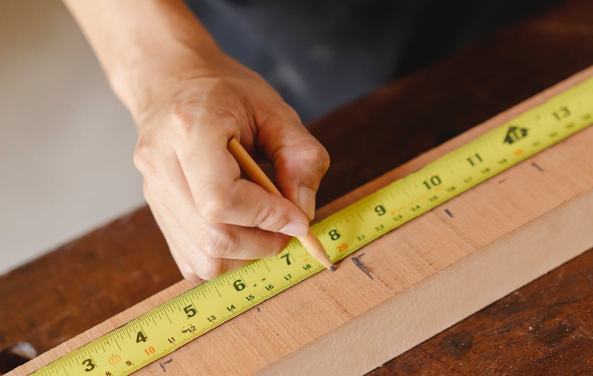What are some tips for measuring and cutting wood accurately? by