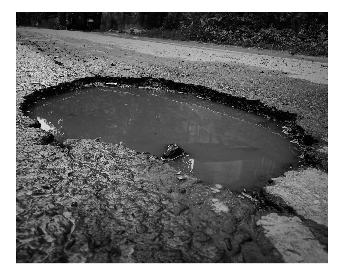 Pothole. My birth did not affect anything just… by Sabir Molla Medium