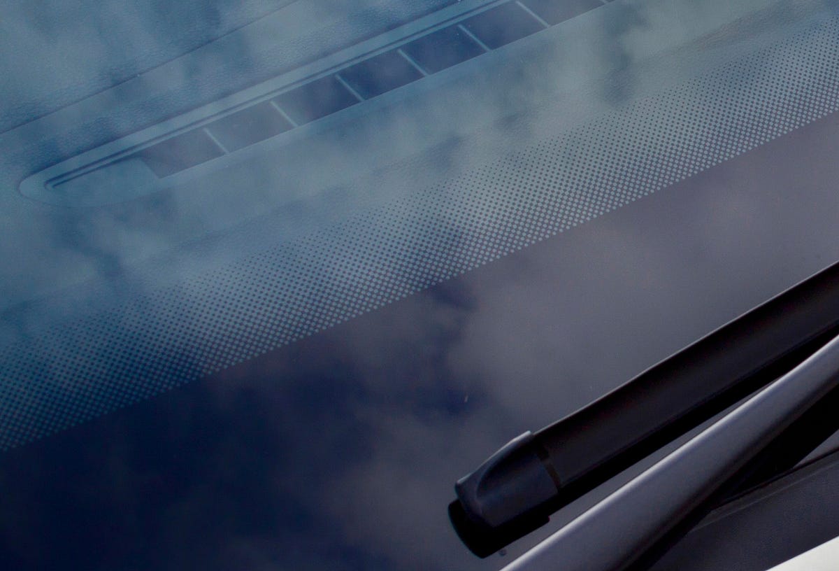 Why Are There Tiny Black Dots Around the Edges of a Windshield? by