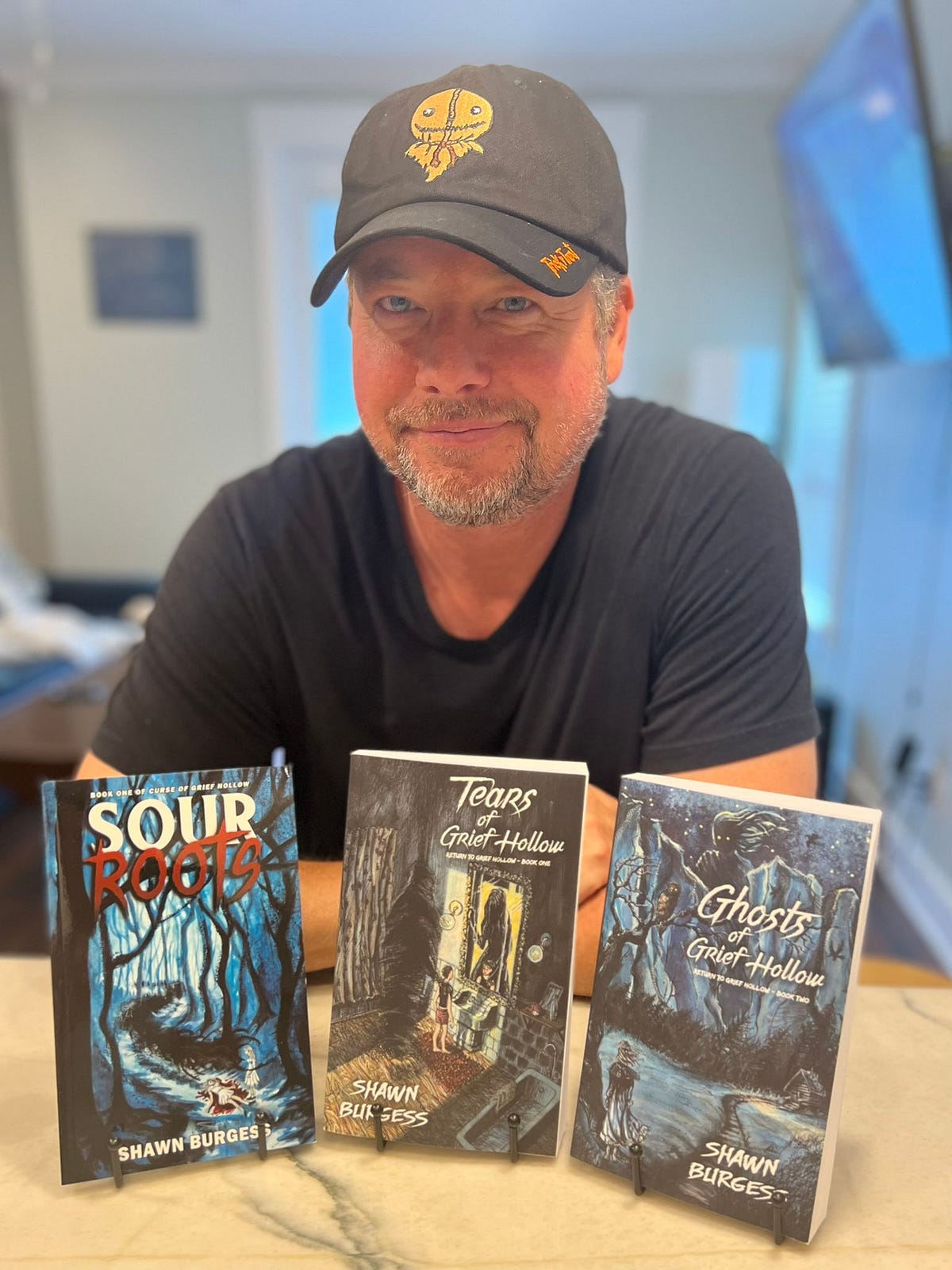 My Review of Shawn Burgess’s The Ghosts of Grief Hollow by DM Shepard Medium