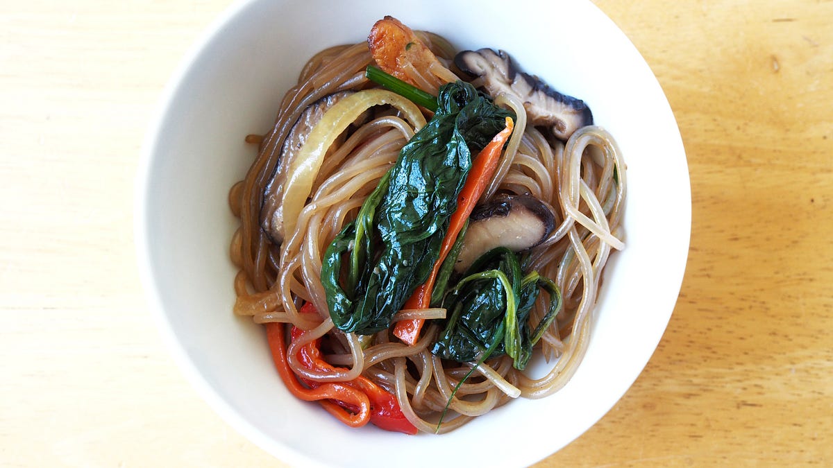 Finding japchae sauce. “It’s in a bottle. Look for a bottle.” by Sara
