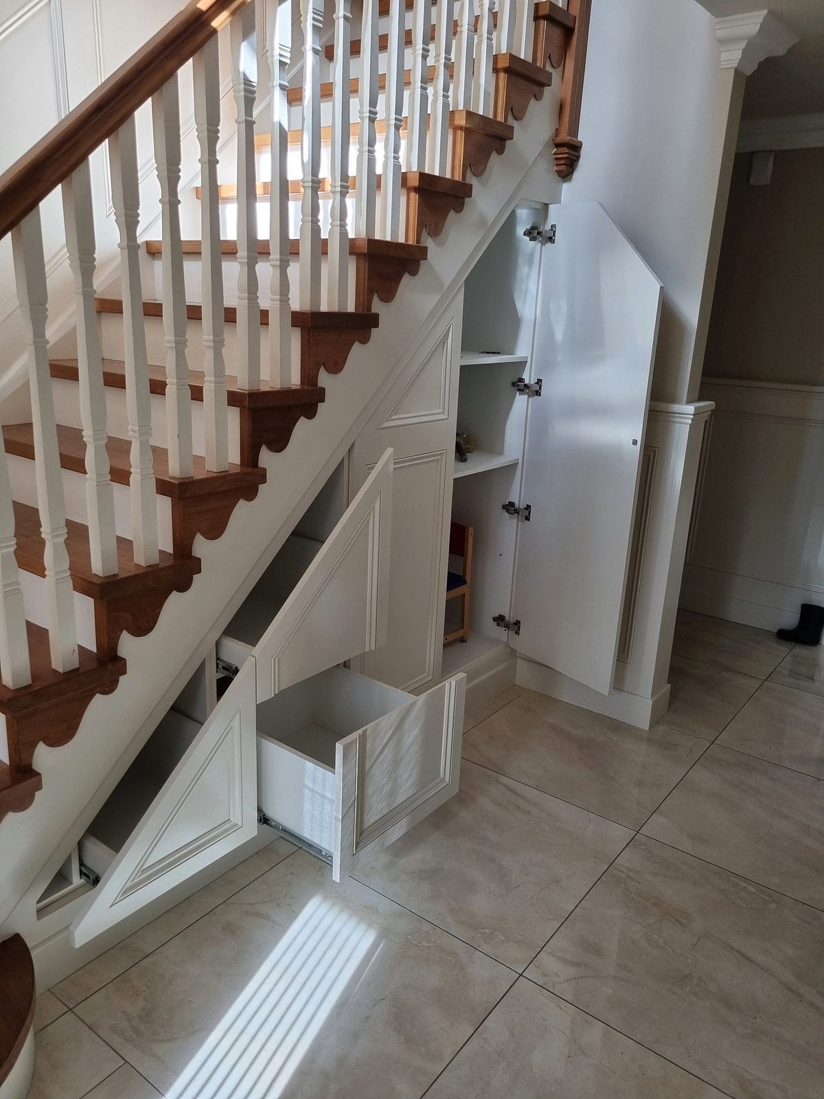 Maximizing Space and Style Under Stairs Storage in Mallow and Fitted