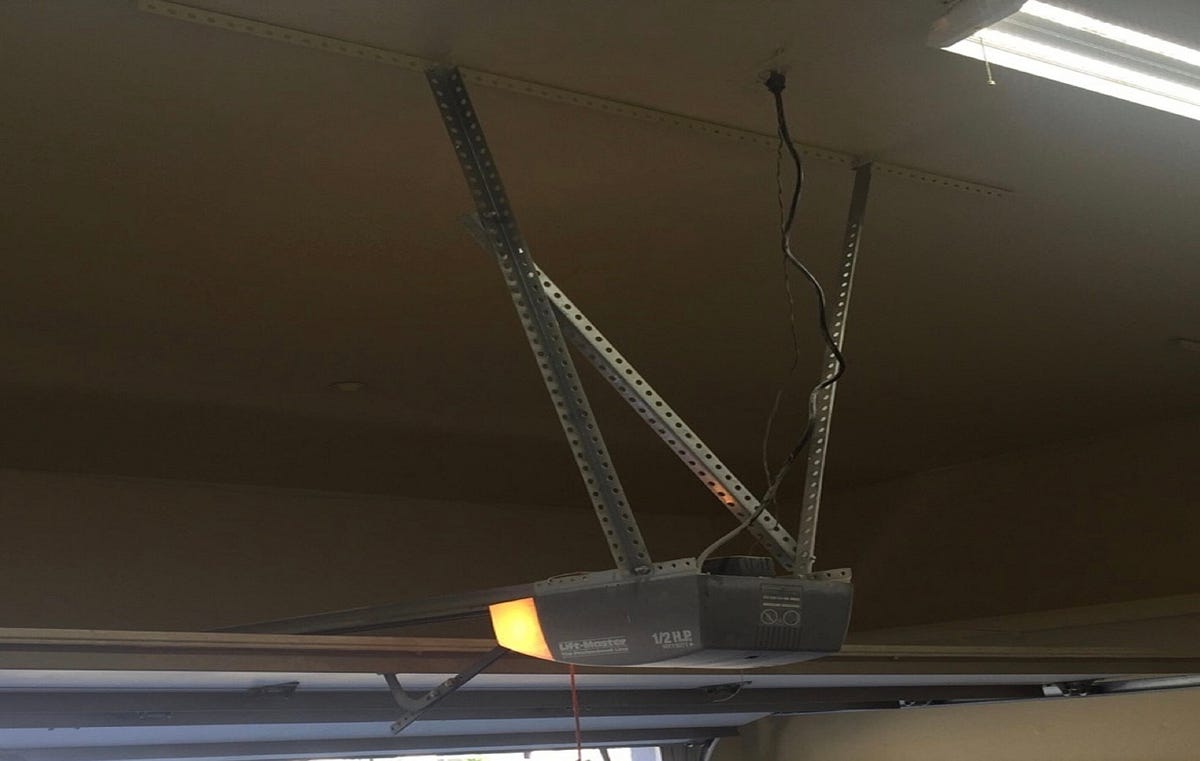 Why Does My Garage Door Makes Loud Noise When Opening? by Louise Rader Medium