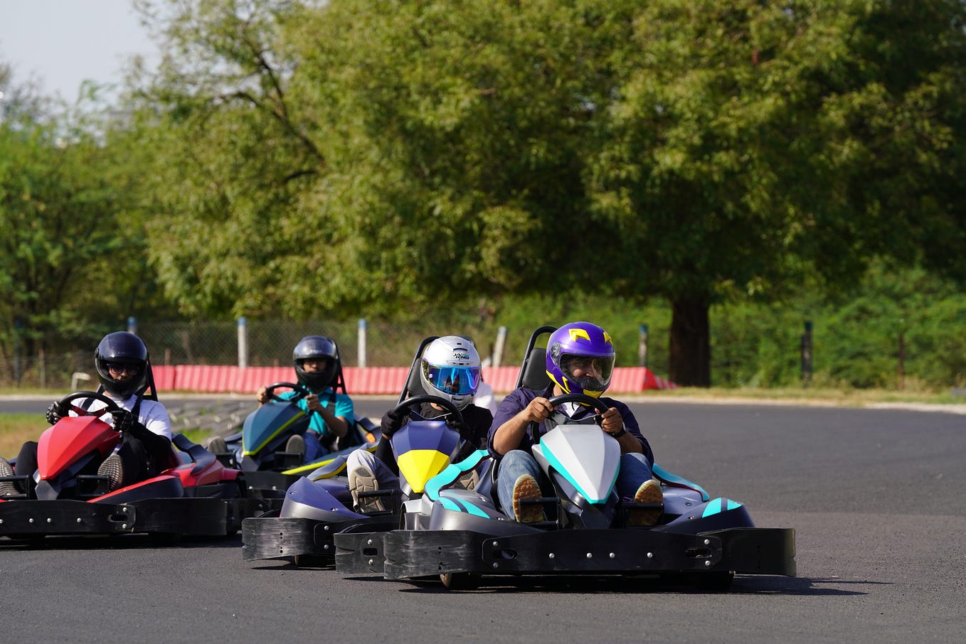 Building the Perfect GoKarting Track Minimum Length, Width, and Area